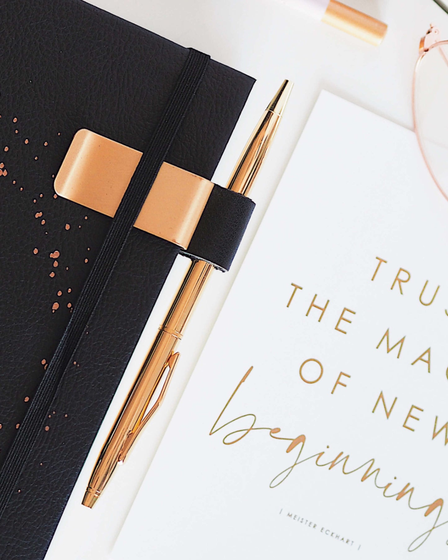 Slim gold ballpoint pen with black ink and medium tip | ella iconic® stationery | UK