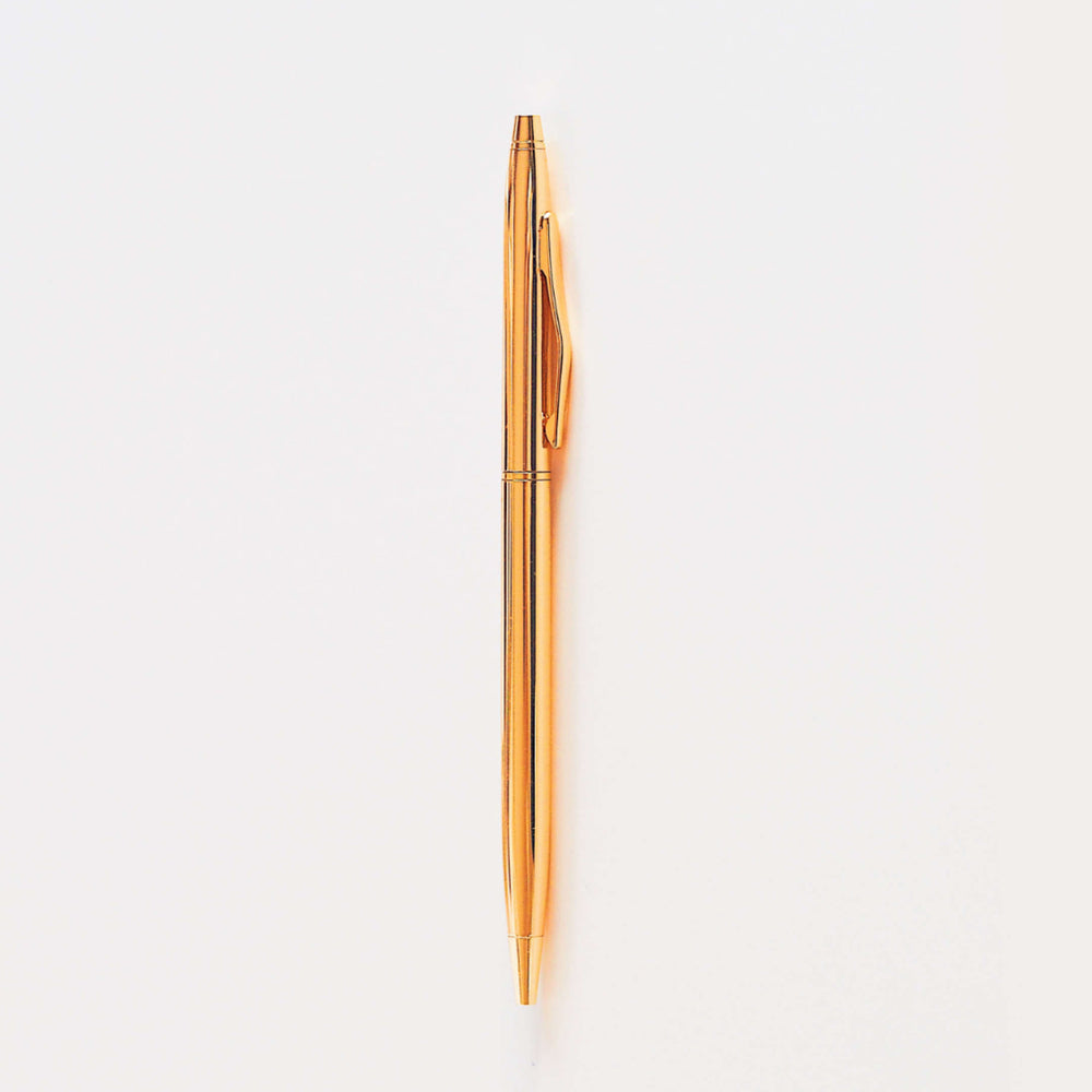 Slim gold ballpoint pen with black ink and medium tip | ella iconic® stationery | UK